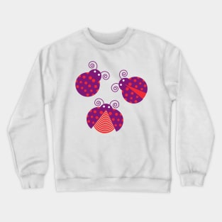 Three purple ladybugs Crewneck Sweatshirt